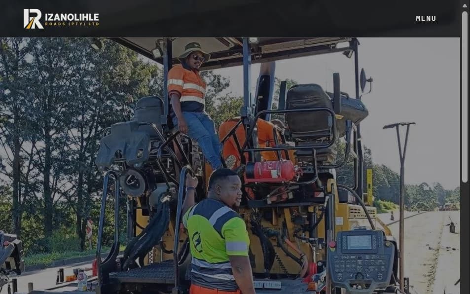Izanolihle Roads home page: a crew working from a CAT paver mid-job on a live provincial road.