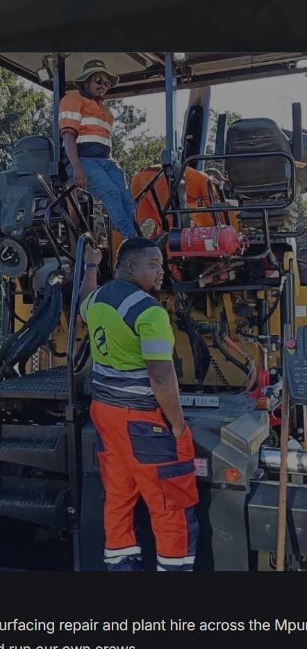 Izanolihle Roads on mobile: the same paver-crew photo cropped for a narrow screen.